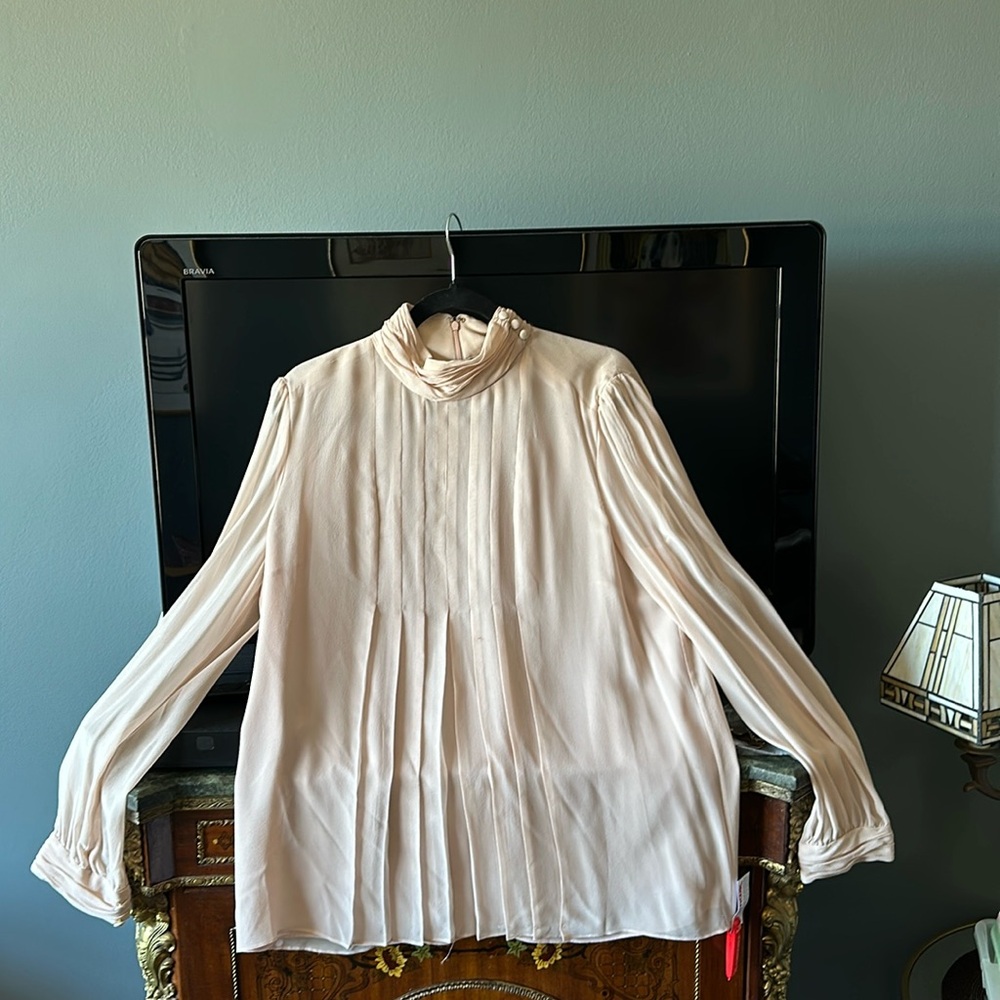 NWT 100% silk, size 14 blush Tory Burch blouse. High neck w pleats in the front.